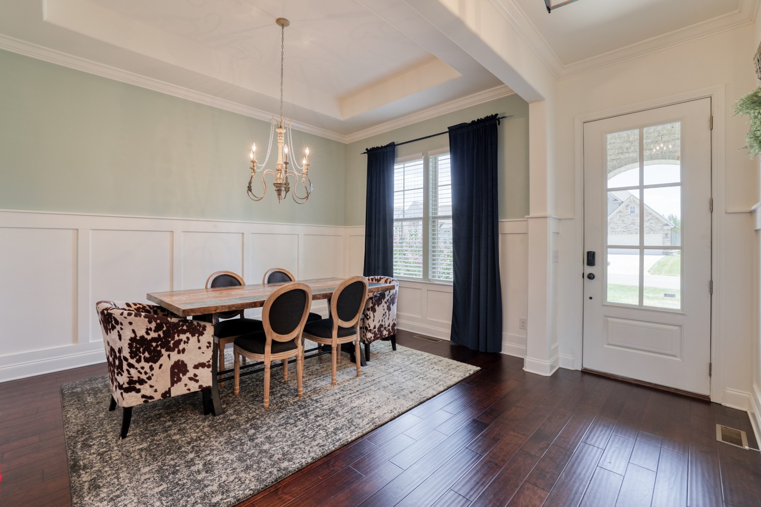 1146 Batbriar Road Murfreesboro, TN 37128 - Photo 10 of 56 a dining room with wooden floor a chandelier a wooden table and chairs
