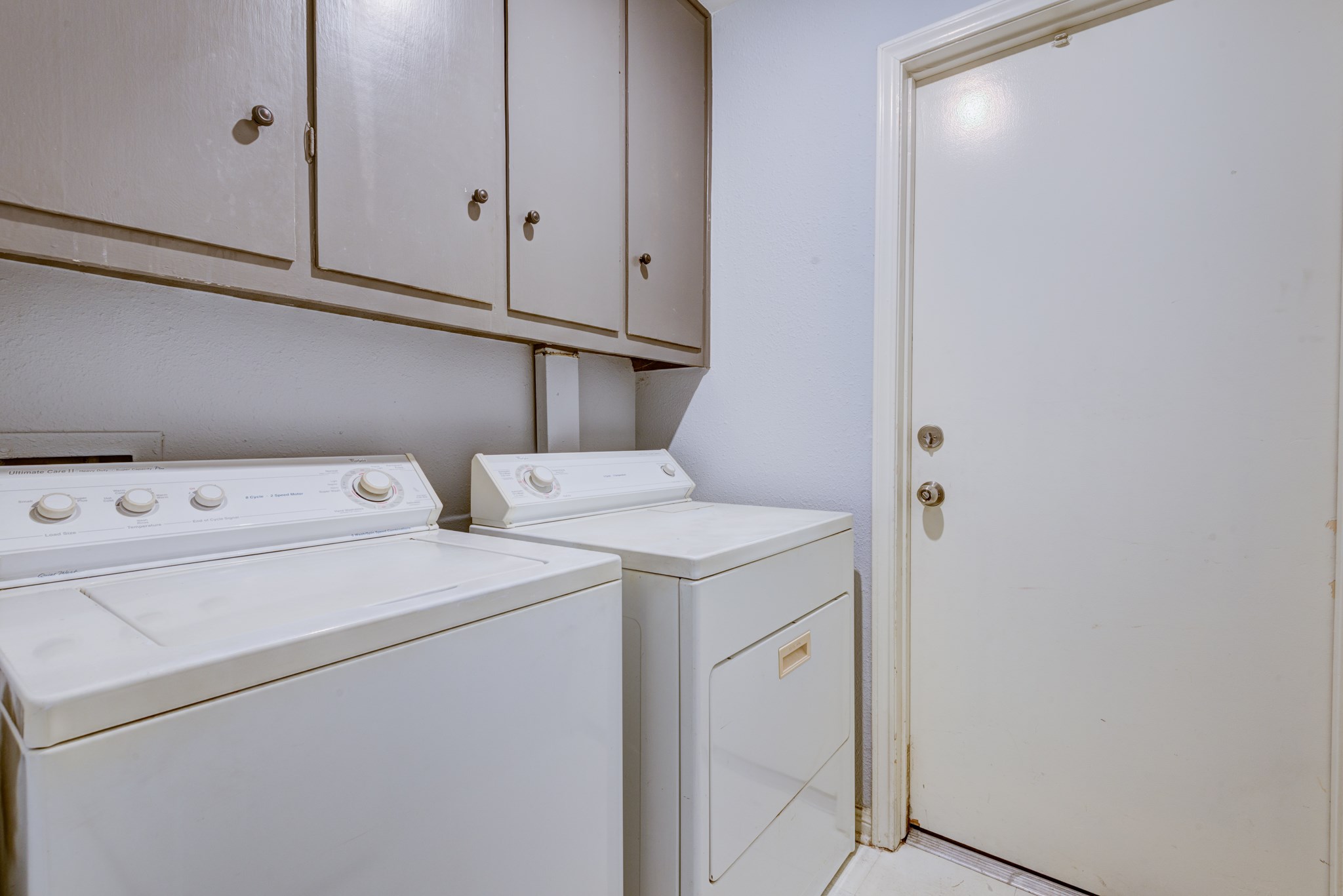 6126 Rena Street Houston, TX 77092 - Photo 15 of 24 a utility room with dryer and washer