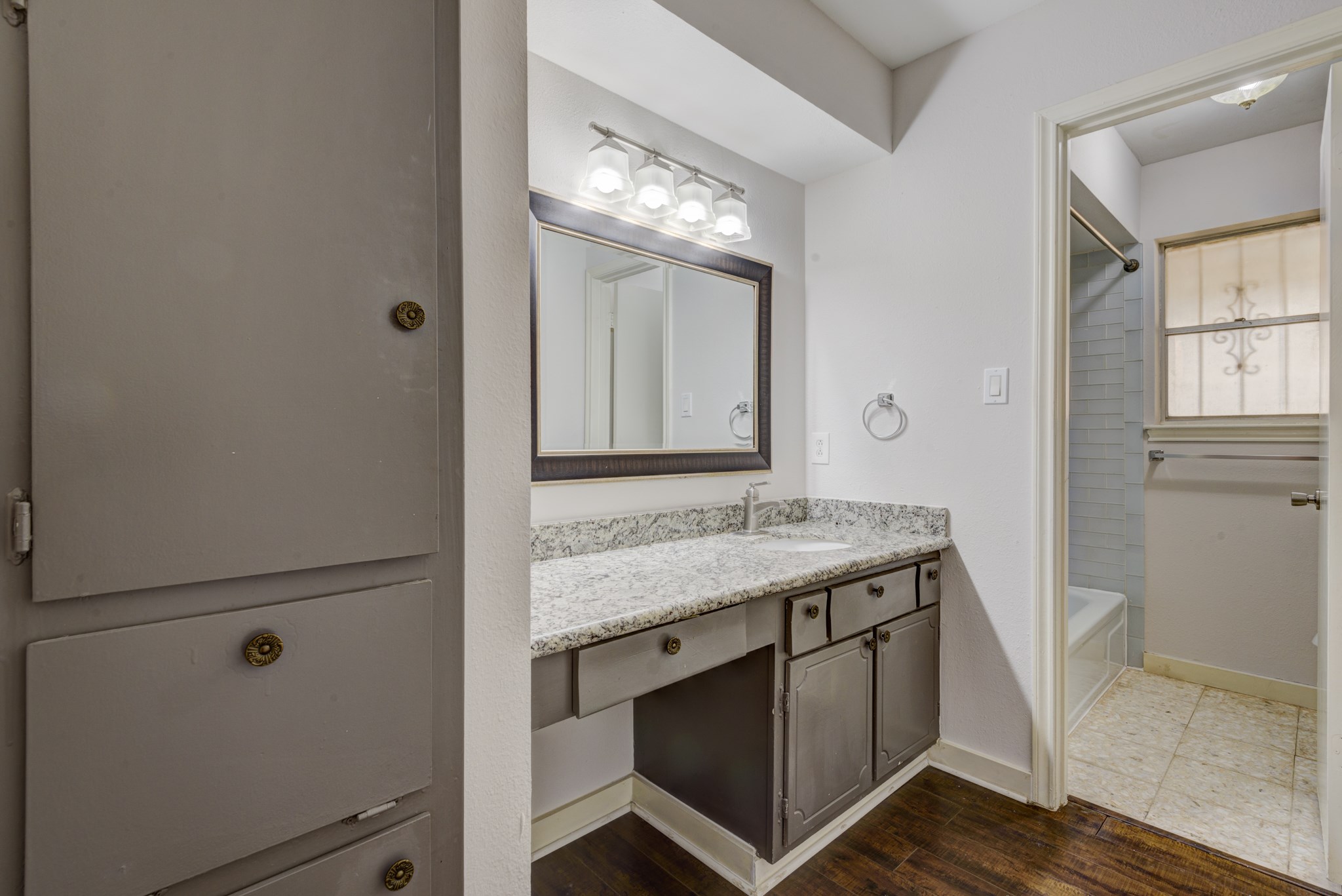 6126 Rena Street Houston, TX 77092 - Photo 20 of 24 a bathroom with a sink and a mirror