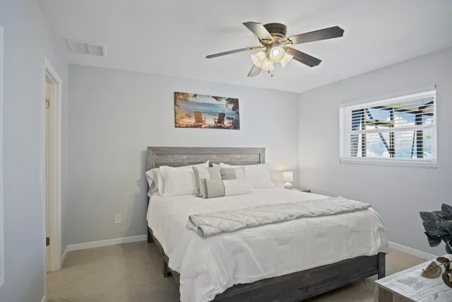 a view of swimming pool with a patio