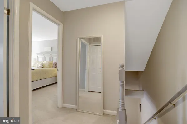 a en suite bathroom with a toilet sink and tub