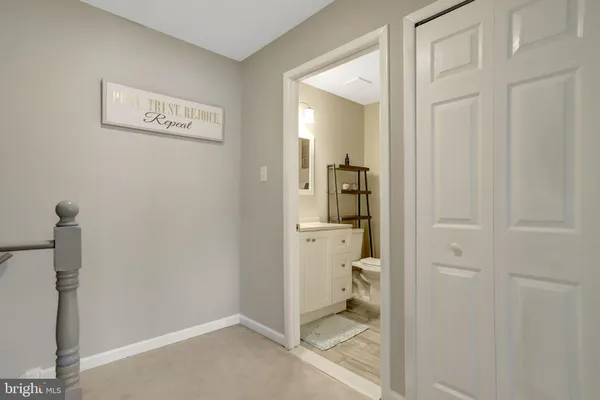 a bathroom with a shower and toilet
