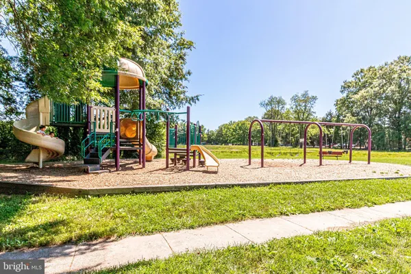 a view of a park with swings
