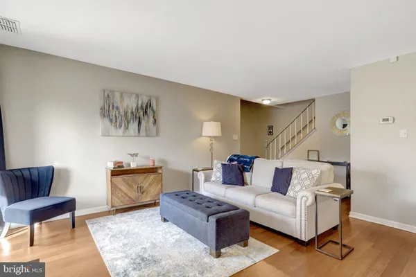 a living room with furniture and a couch