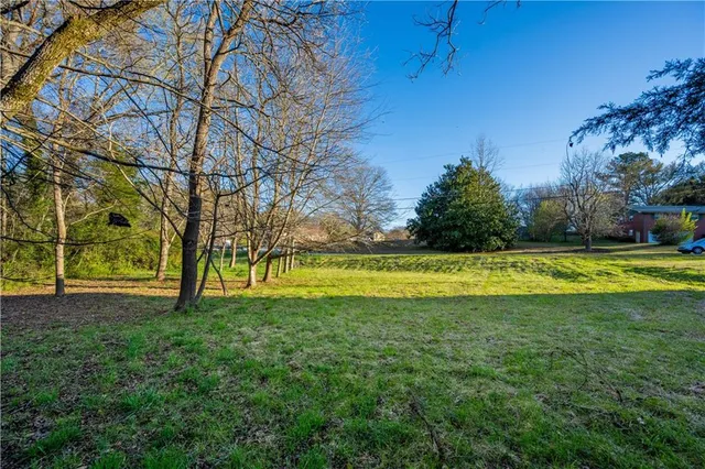 a view of swimming pool with an outdoor space and seating area