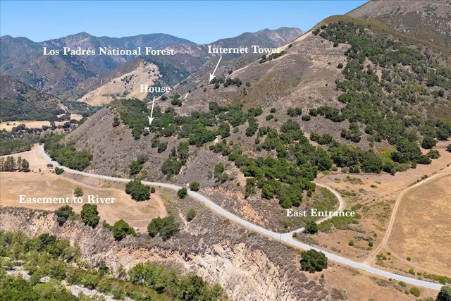 a view of a yard with a mountain