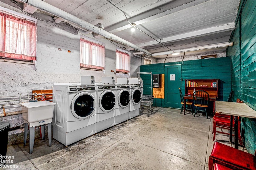 35-45 82nd Street, Unit 4 Queens, NY 11372 - Photo 14 of 15 a utility room with dryer and washer
