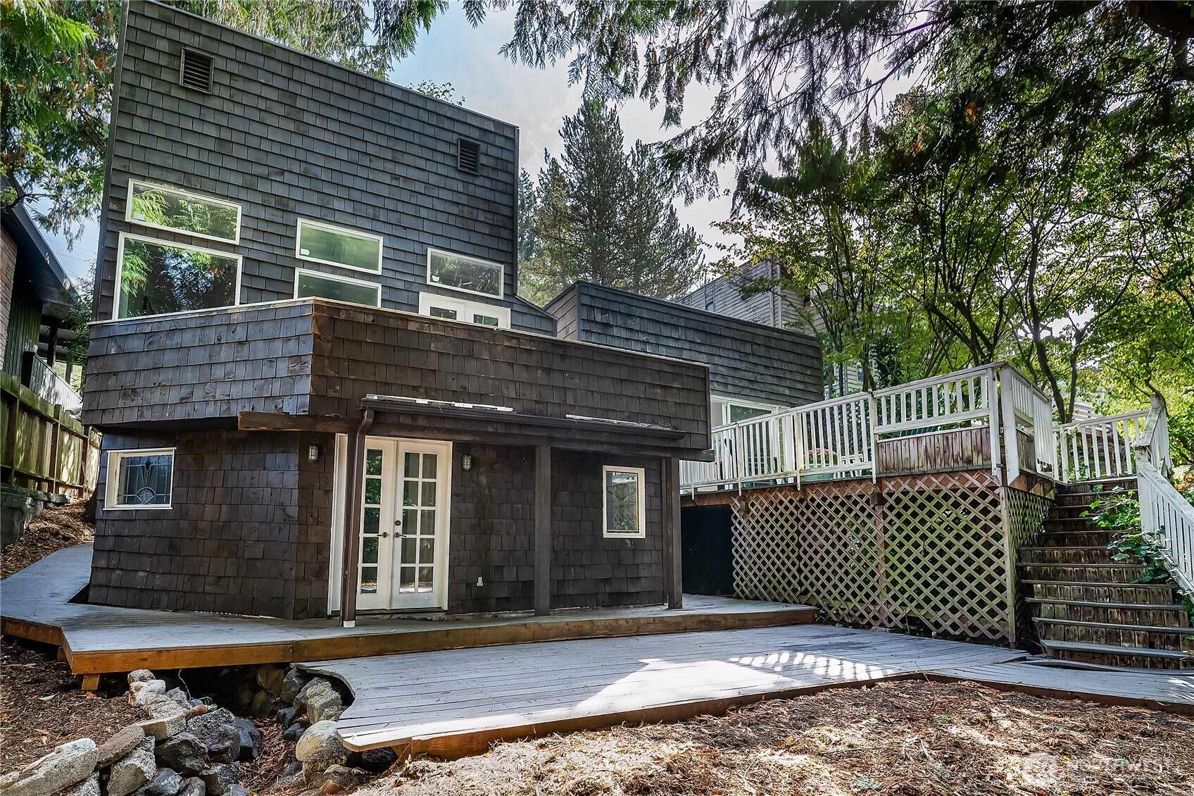 9521 25th Avenue Northwest Seattle, WA 98117 - Photo 26 of 29 a view of a house with a iron gate