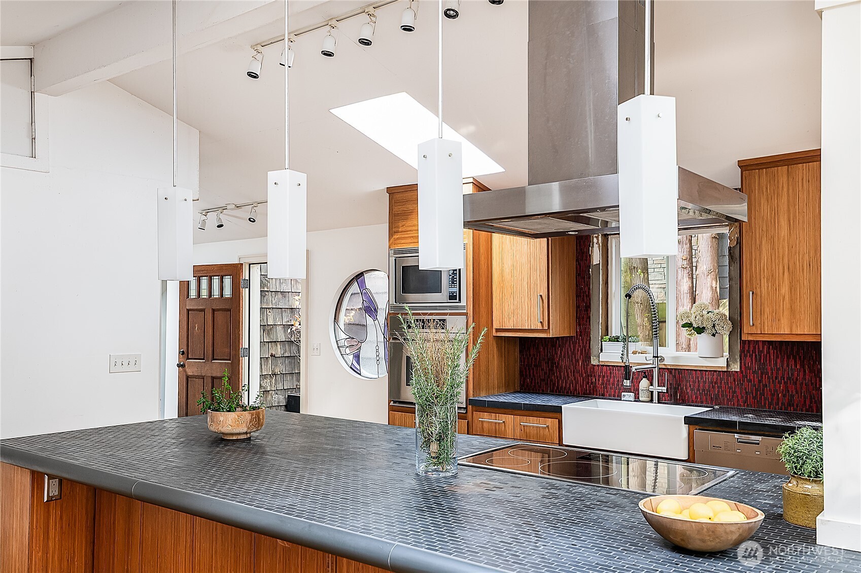 9521 25th Avenue Northwest Seattle, WA 98117 - Photo 7 of 29 a living room with furniture and wooden floor