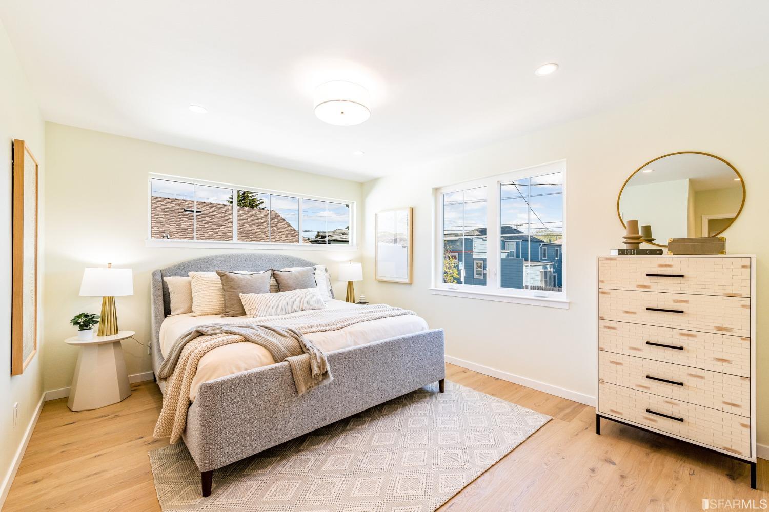 1639 Oregon Street Berkeley, CA 94703 - Photo 17 of 35 a bedroom with a bed and a dresser