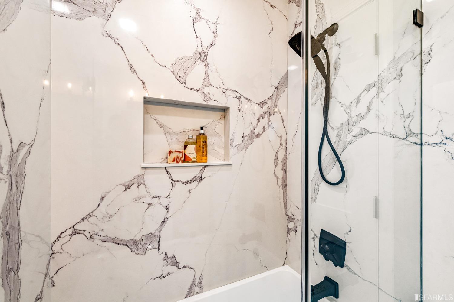 1639 Oregon Street Berkeley, CA 94703 - Photo 26 of 35 a bathroom with a bathtub and shower