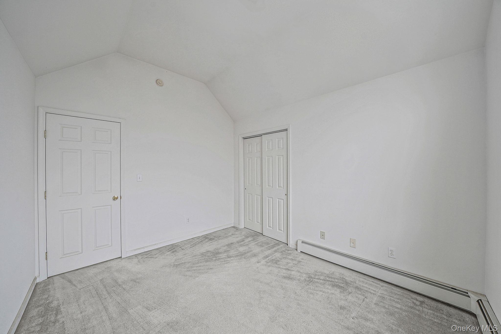 22 Wright Road Manorville, NY 11949 - Photo 19 of 47 a view of an empty room