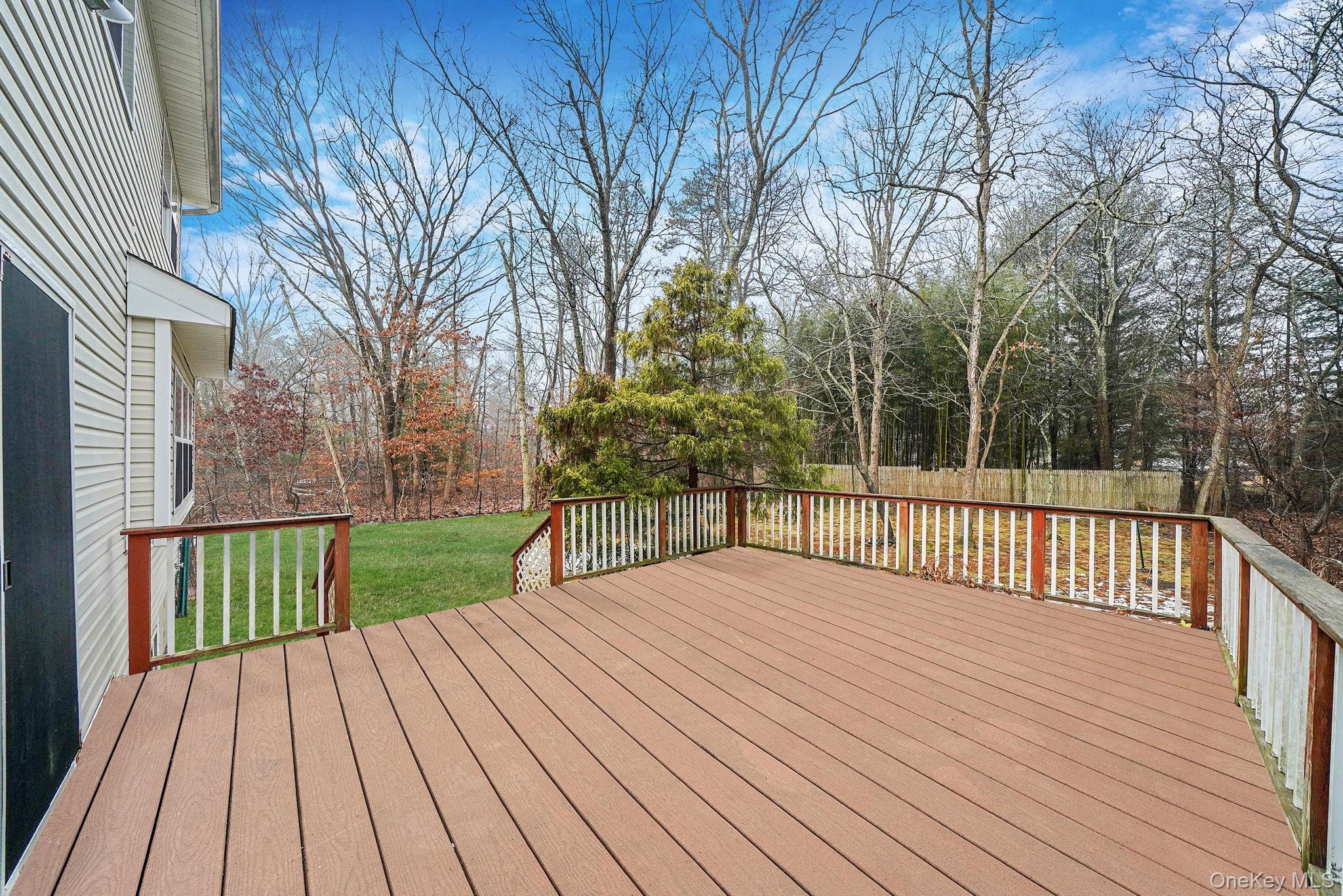 22 Wright Road Manorville, NY 11949 - Photo 32 of 47 a view of a wooden deck