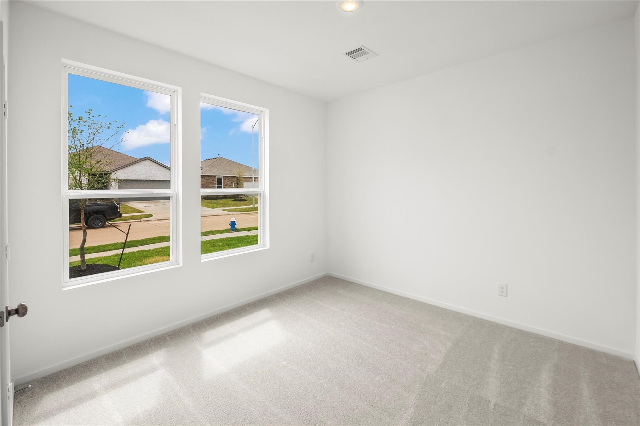 8310 Opal Pond Drive Angleton, TX 77515 - Photo 7 of 22 an empty room with a window