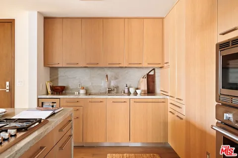 a bedroom with bed and window