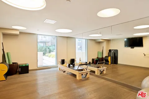 a lobby with furniture and window