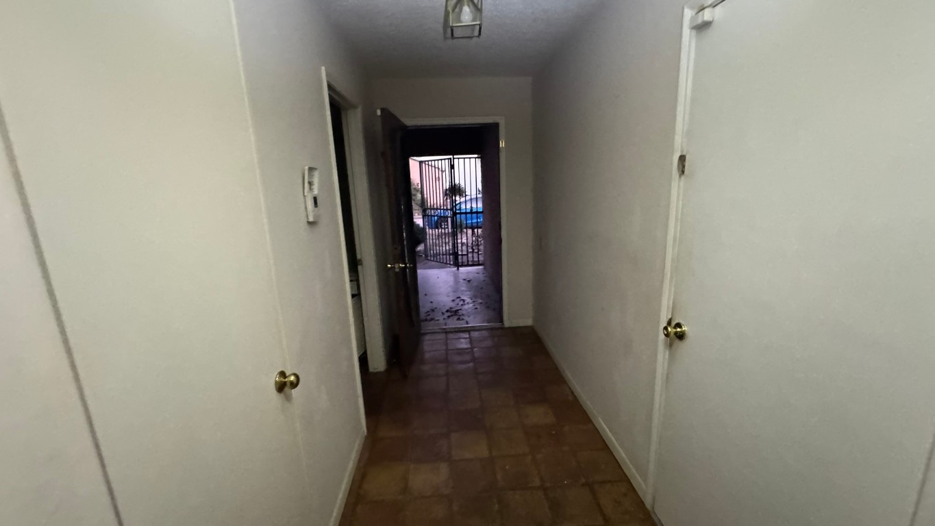 2162 Paso Rello Drive Houston, TX 77077 - Photo 15 of 32 a view of a hallway to a bedroom