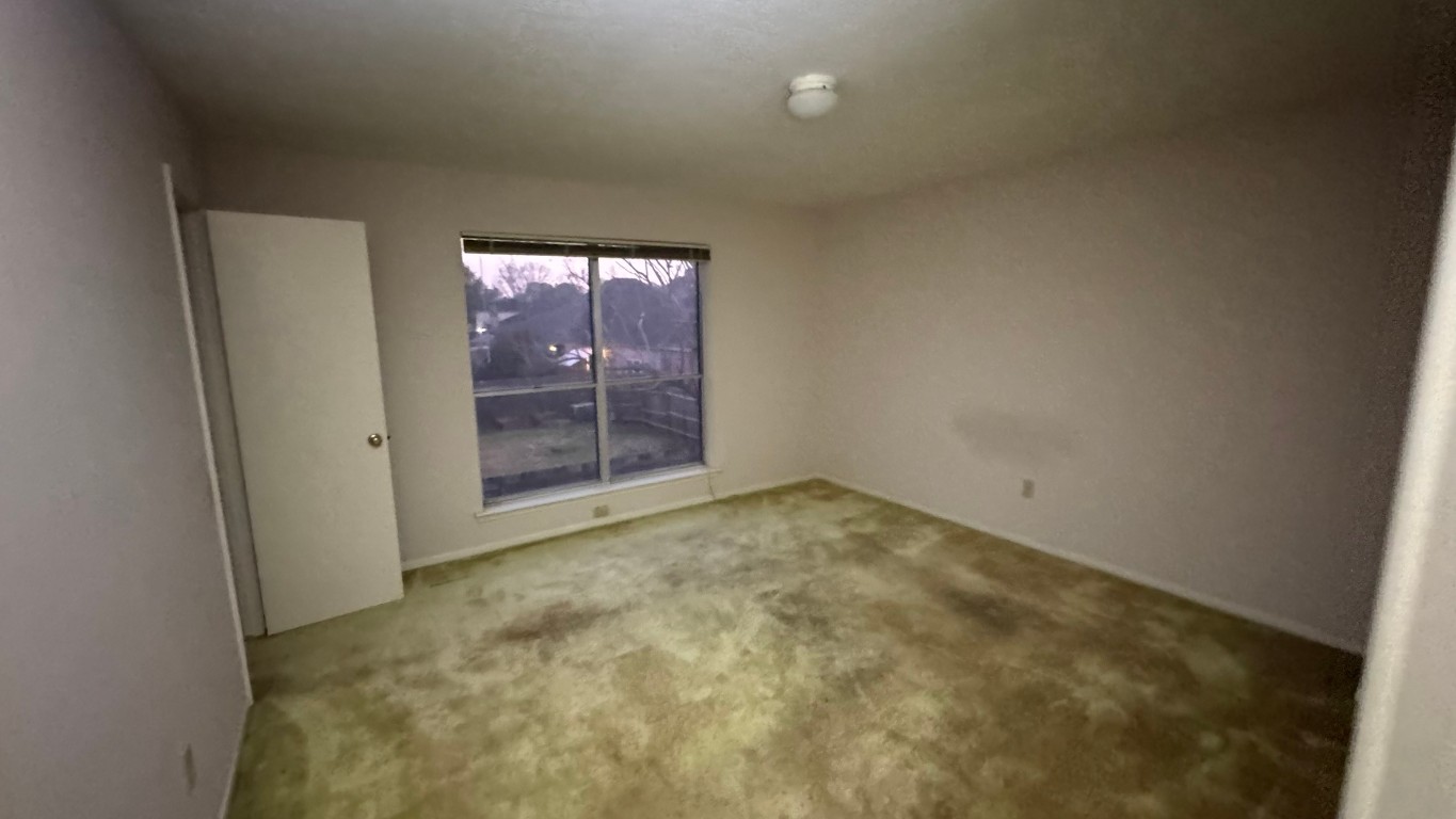 2162 Paso Rello Drive Houston, TX 77077 - Photo 22 of 32 an empty room with windows