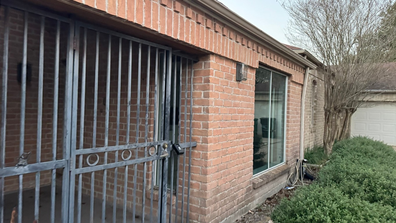 2162 Paso Rello Drive Houston, TX 77077 - Photo 3 of 32 a view of a wooden door of a house