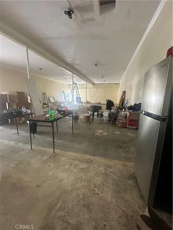 a living room with lots of furniture and a rug