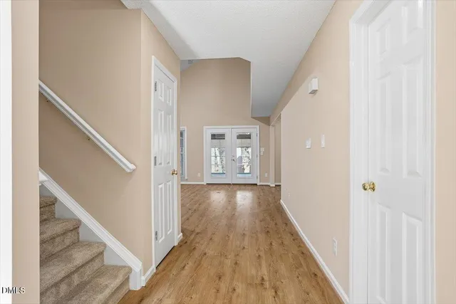 a view of entryway with wooden floor