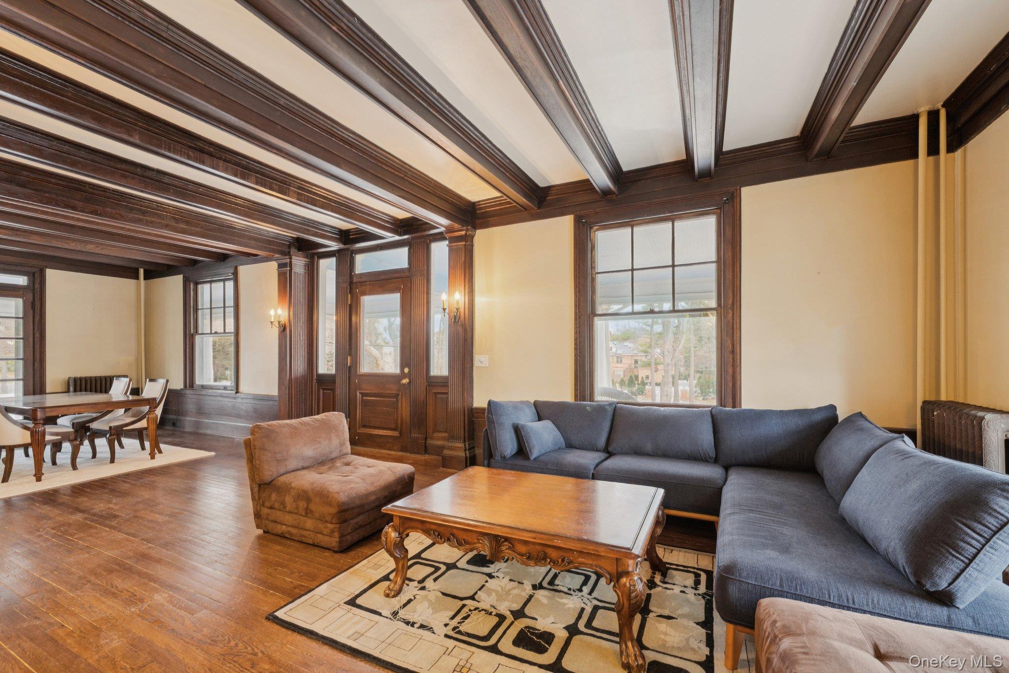 397 Split Rock Road Syosset, NY 11791 - Photo 8 of 29 a living room with furniture and a large window