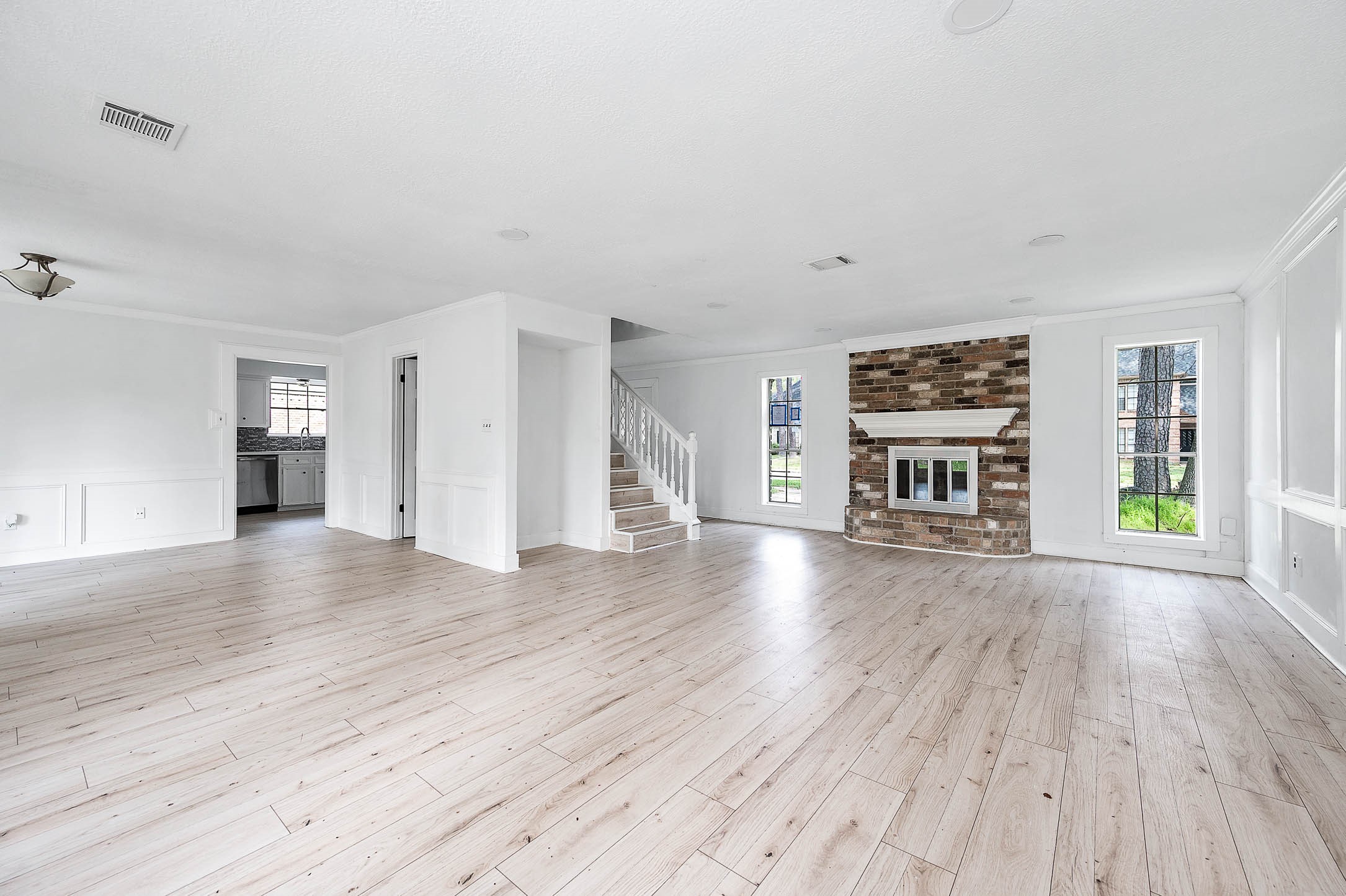 17627 Terrawren Lane Spring, TX 77379 - Photo 8 of 30 an empty room with wooden floor and windows