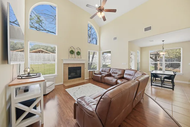 a view of a dining room with furniture and window