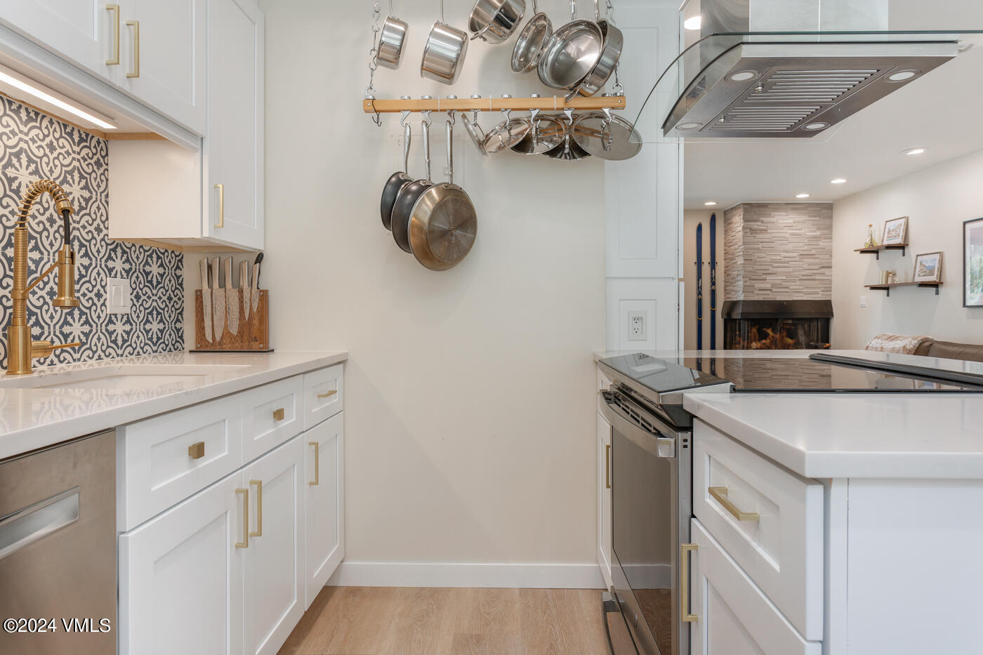 2199 Chamonix Lane, Unit 9 Vail, CO 81657 - Photo 14 of 24 a kitchen with a sink a stove and cabinets