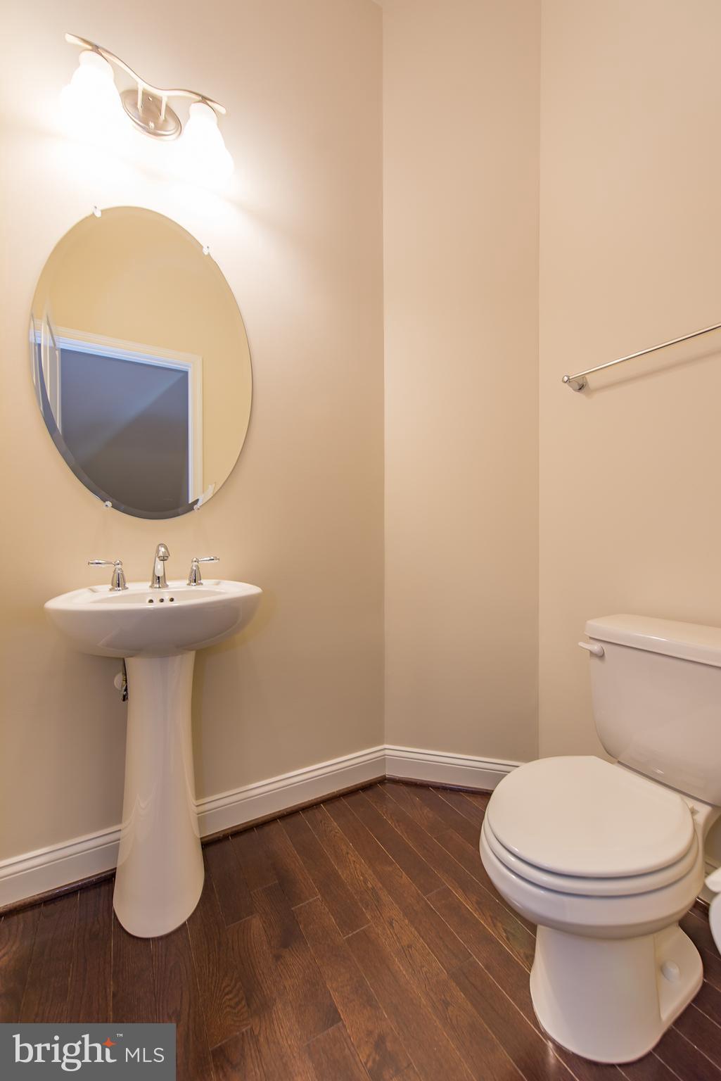 1163 Holden Road Frederick, MD 21701 - Photo 14 of 30 a bathroom with a sink toilet and mirror