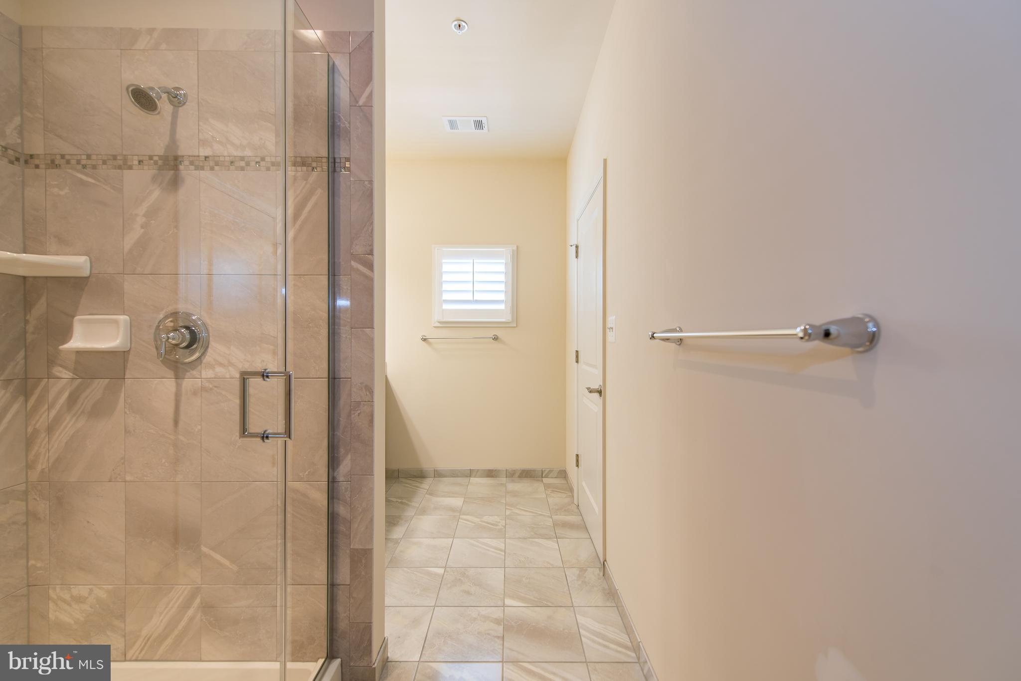 1163 Holden Road Frederick, MD 21701 - Photo 18 of 30 a bathroom with a shower