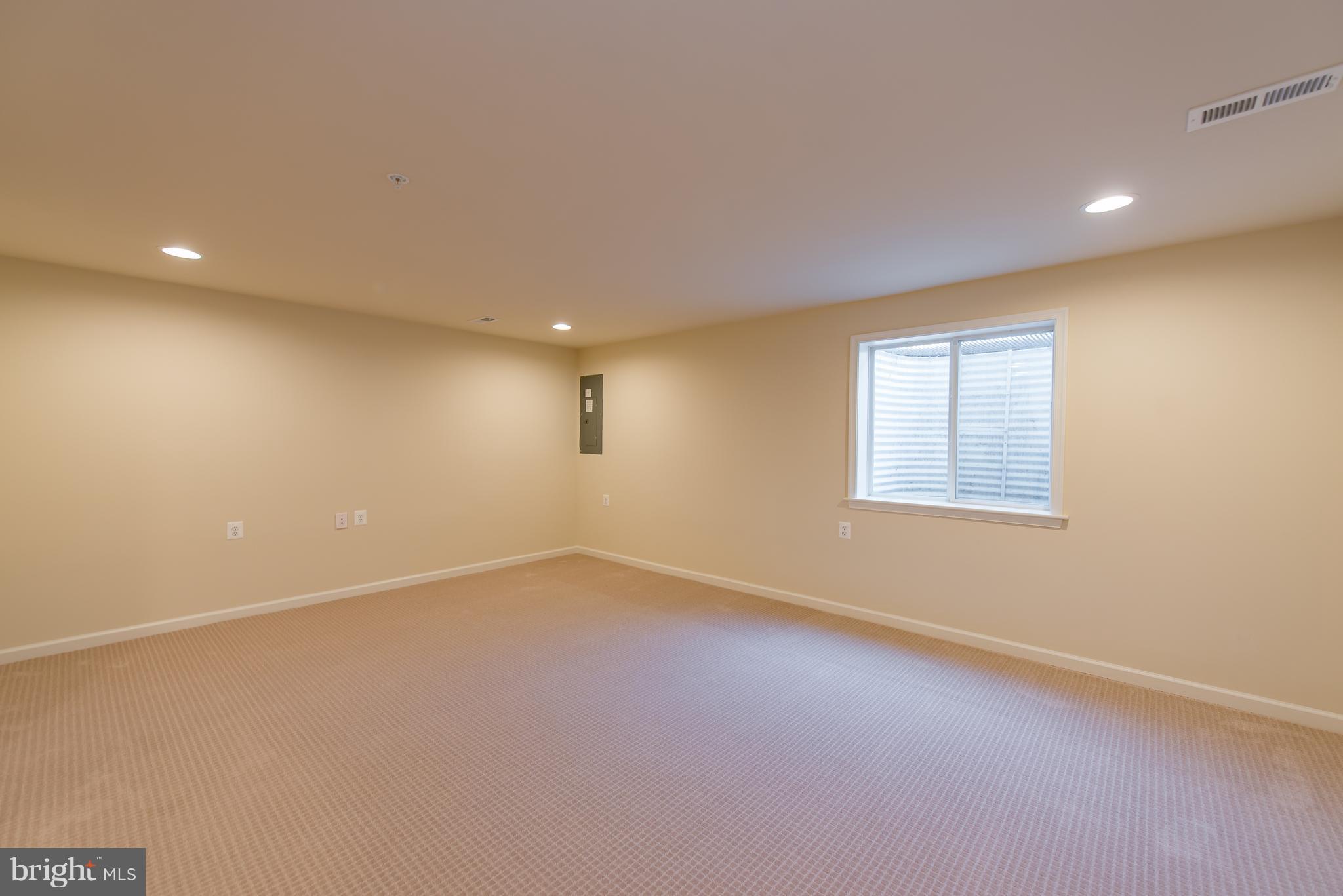 1163 Holden Road Frederick, MD 21701 - Photo 26 of 30 an empty room with a empty space and windows
