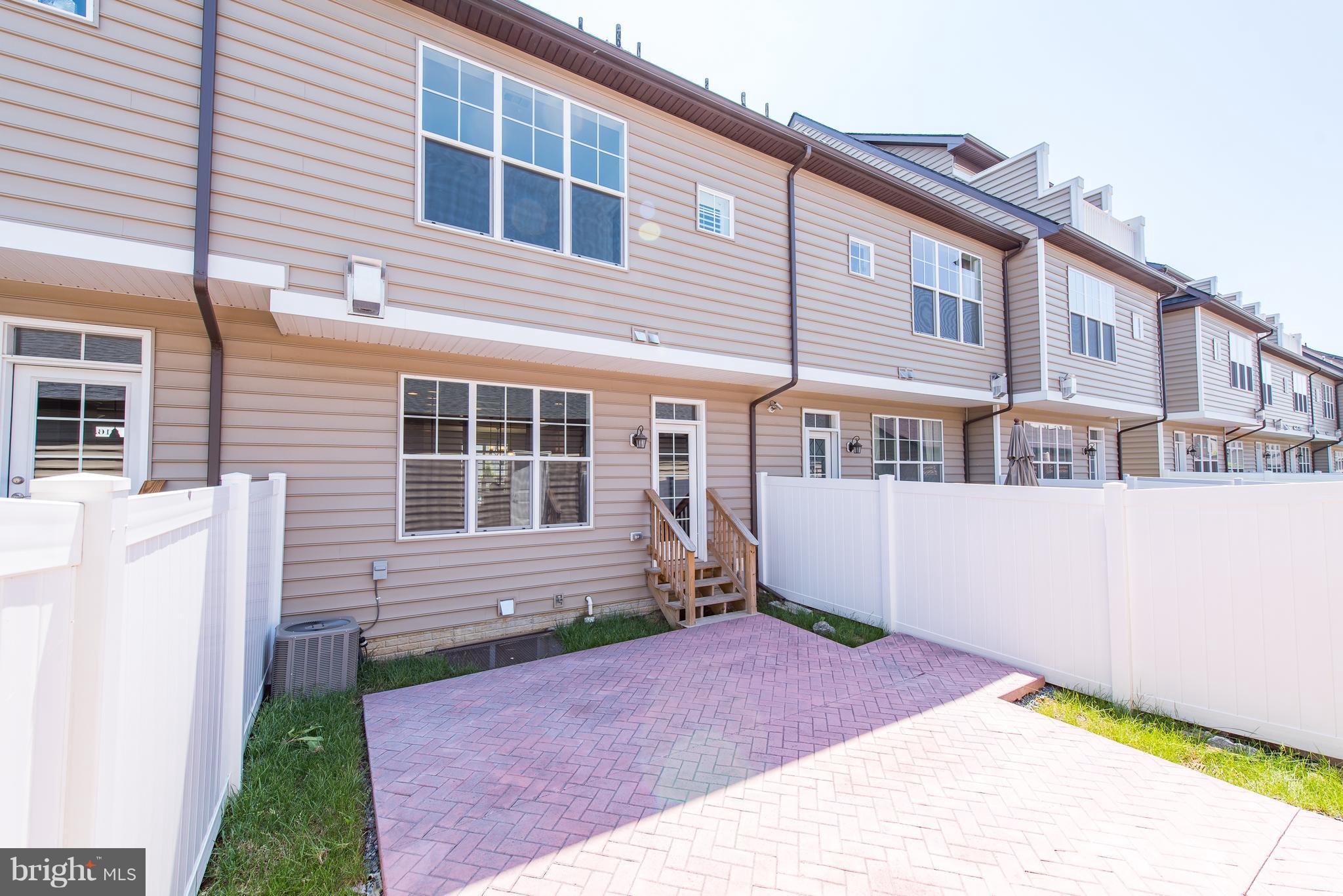 1163 Holden Road Frederick, MD 21701 - Photo 29 of 30 a front view of a house with a yard