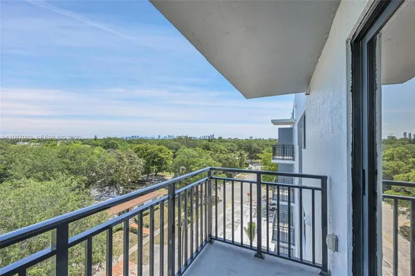 a view of a balcony with an outdoor space