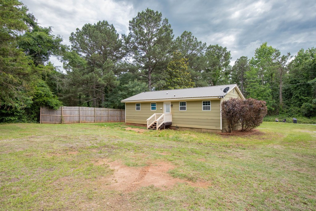 246 Sunnyside Church Road Pine Mountain, GA 31822 - Photo 21 of 26 a view of a house with a backyard