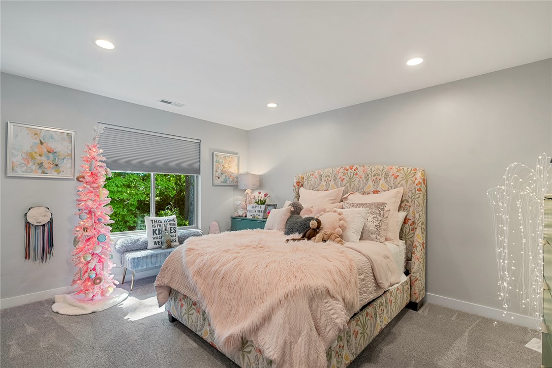140 Turnberry Road Anderson, SC 29621 - Photo 23 of 44 This serene bedroom offers a comfortable retreat with a peaceful ambiance and ample natural light.