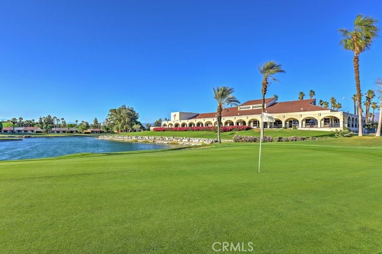 77313 Preston Trail Palm Desert, CA 92211 - Photo 13 of 15 a childrens park with lots of swings and slides