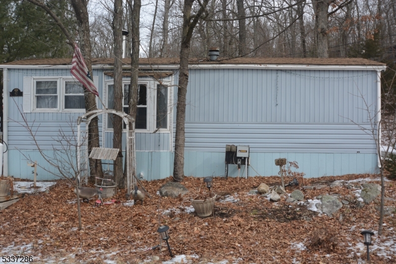42 Elm Village Vernon, NJ 07461 - Photo 27 of 33 a view of a house with a back yard