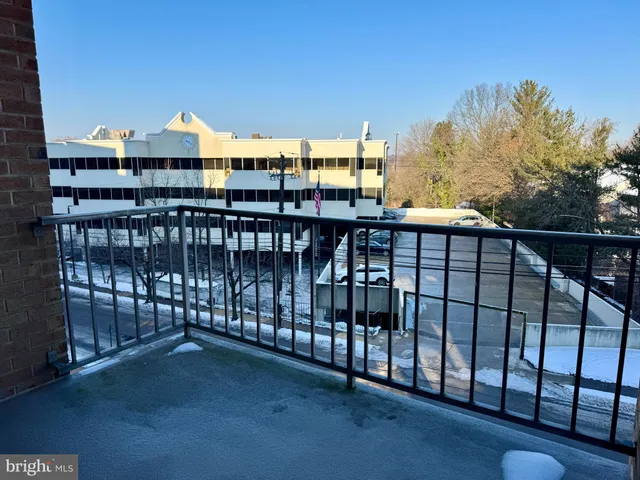 a view of a balcony with city view