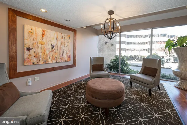 a view of a livingroom with furniture and window