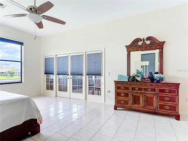 a room with a sink and a mirror