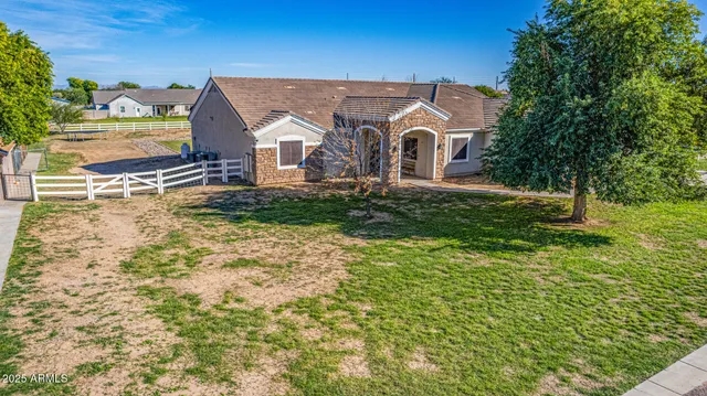 a kitchen with stainless steel appliances granite countertop a sink counter space and cabinets