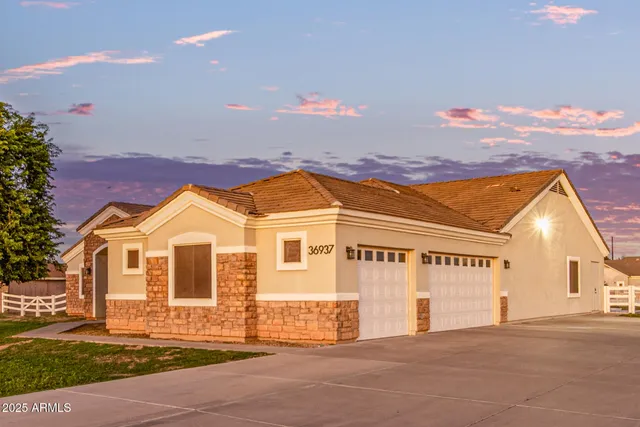 a bathroom with a toilet a sink and a mirror
