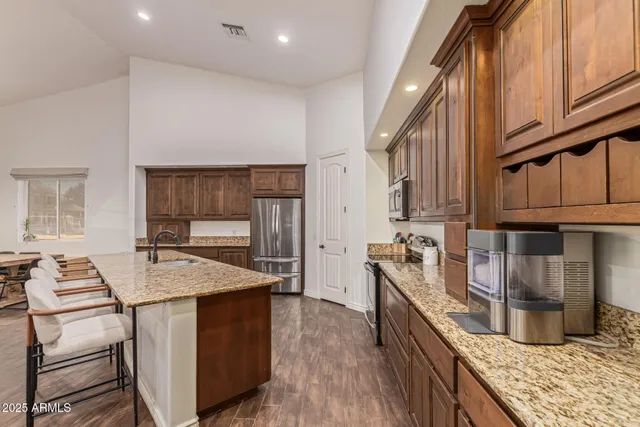 a bedroom with a bed and a ceiling fan