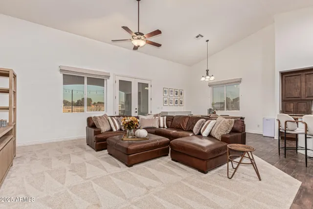 a white toilet sitting next to a shower curtain