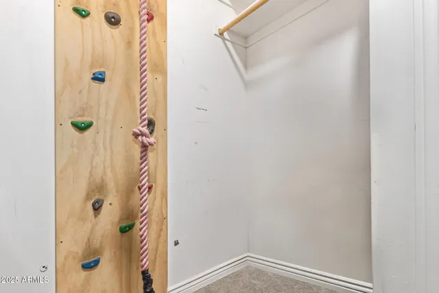 a view of a terrace with wooden floor and a city view