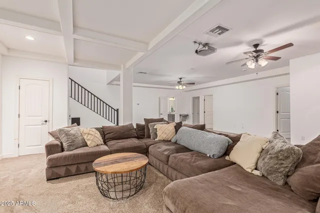 a view of balcony with two chairs and ocean view