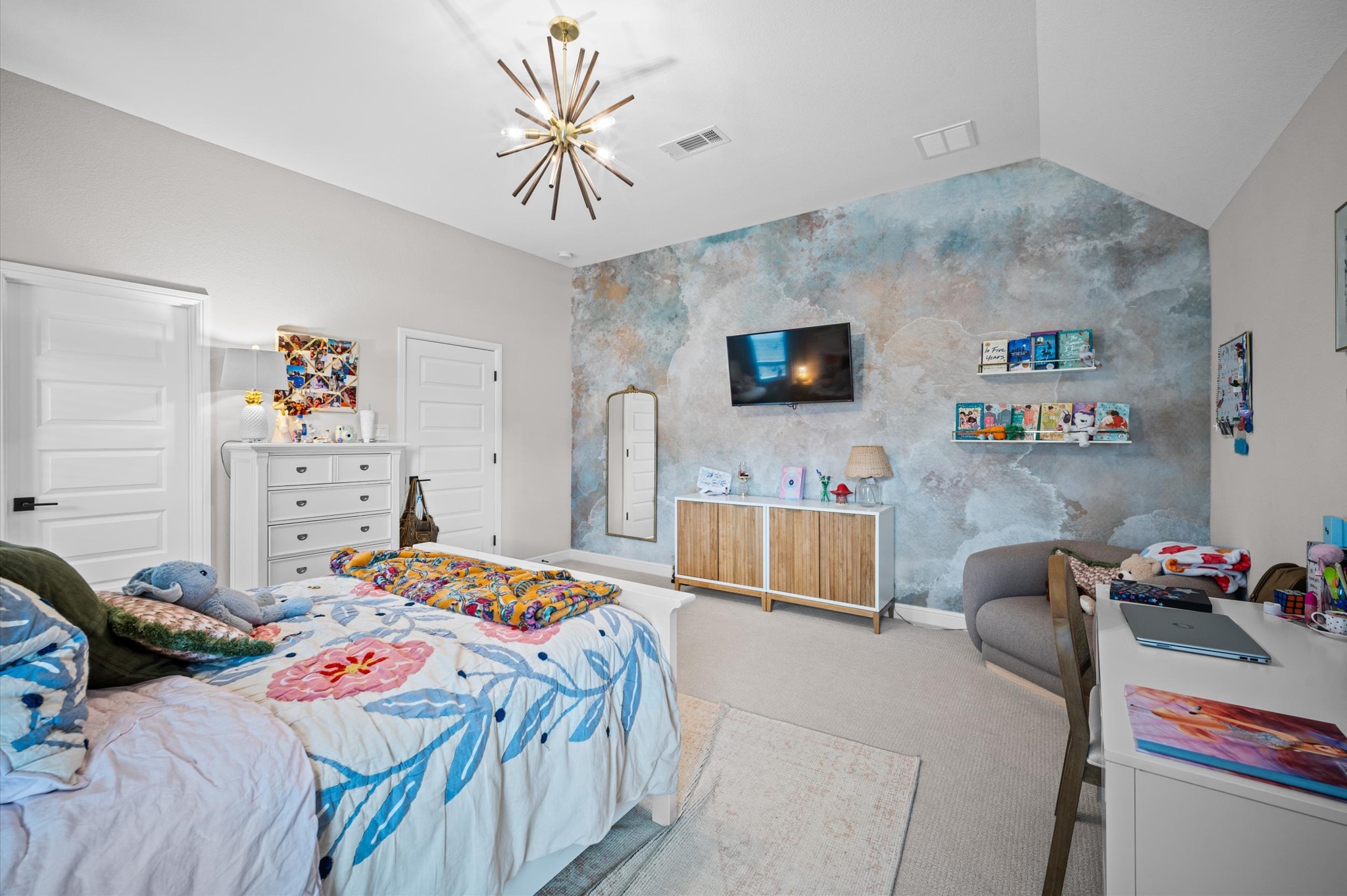 4923 Grapevine Lane Manvel, TX 77578 - Photo 33 of 49 a bedroom that has a bed and a flat screen tv