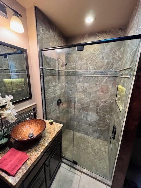 80501 Ave 48, Unit 214 Indio, CA 92201 - Photo 12 of 21 a bathroom with a sink and a mirror