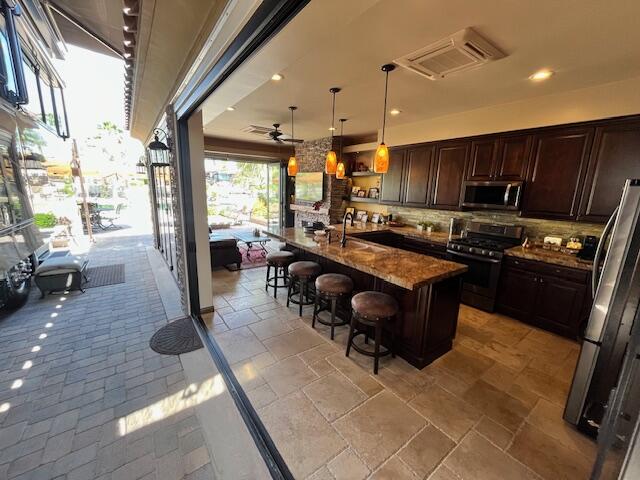 80501 Ave 48, Unit 214 Indio, CA 92201 - Photo 3 of 21 a kitchen with granite countertop lots of counter top space